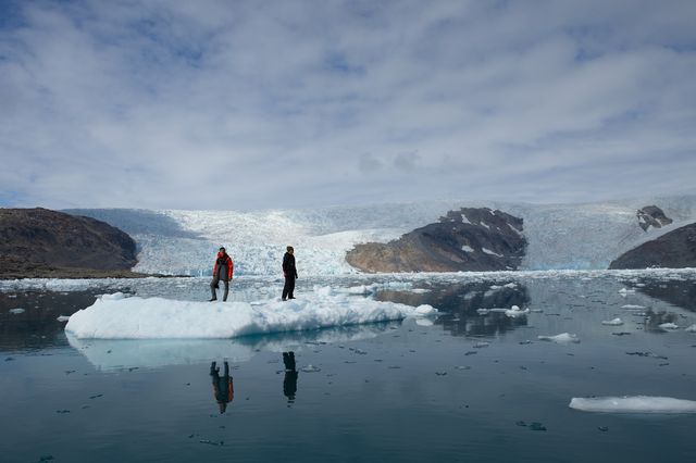 David Gruber (left) and John Sparks (right) on an iceberg in eastern Greenland.